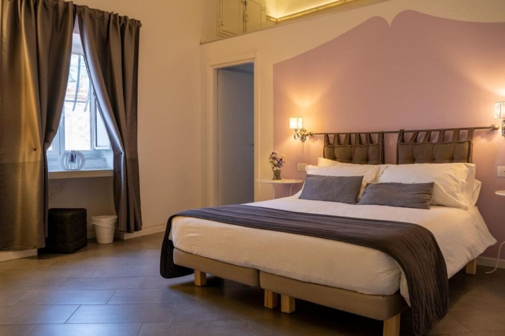One of the bedrooms in Sotto Le Stelle Ai Decumani.