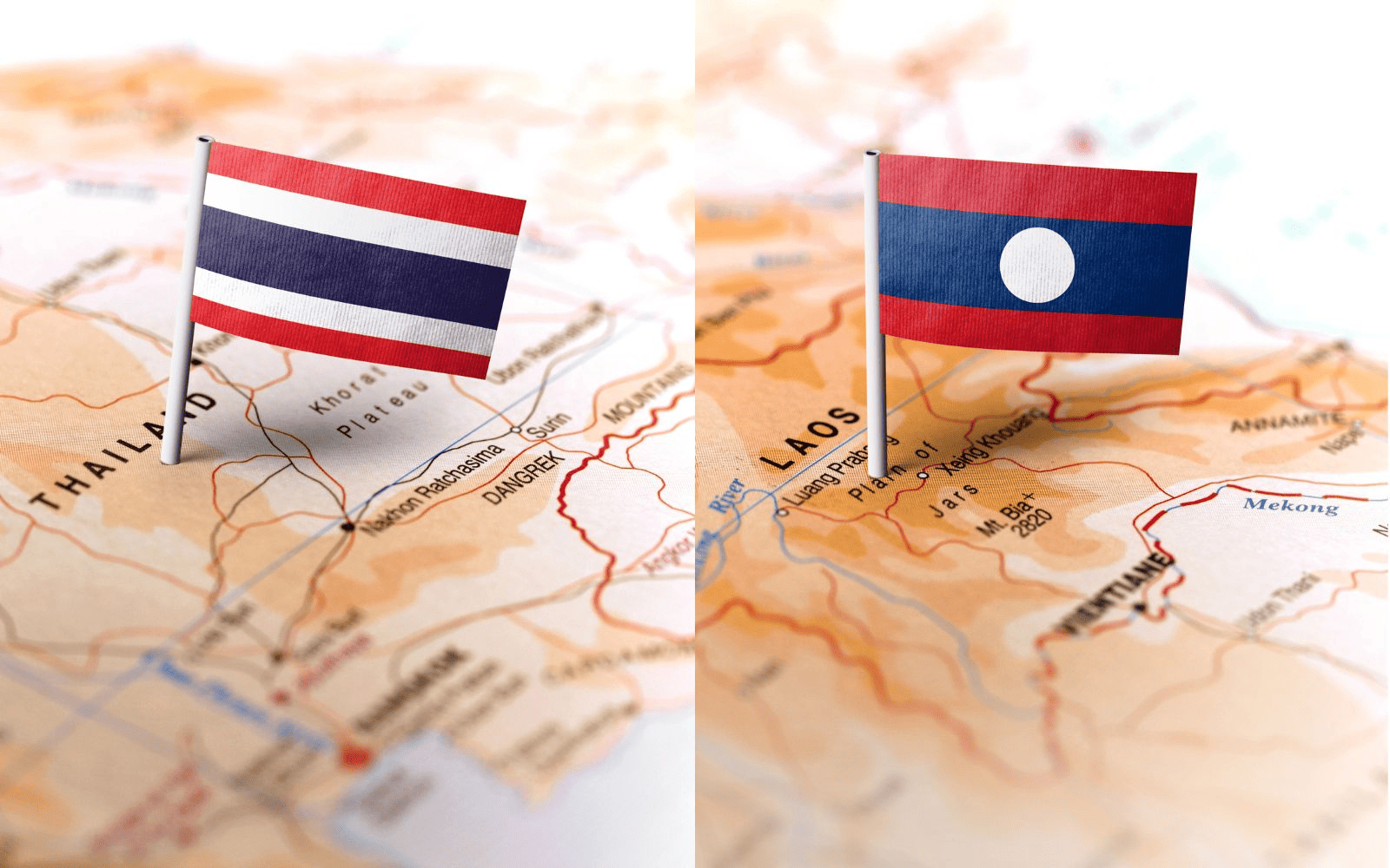 Thail map with Thai flag next to Lao map with Laos flag