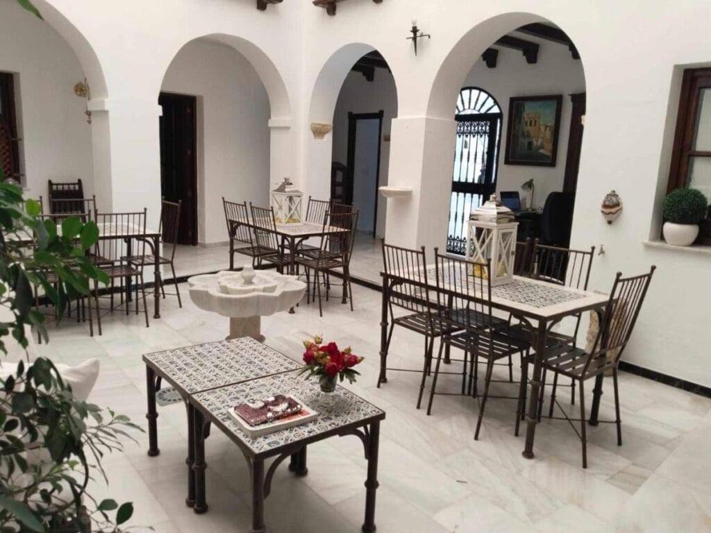 dining area and lobby at the hostel with traditional design tables