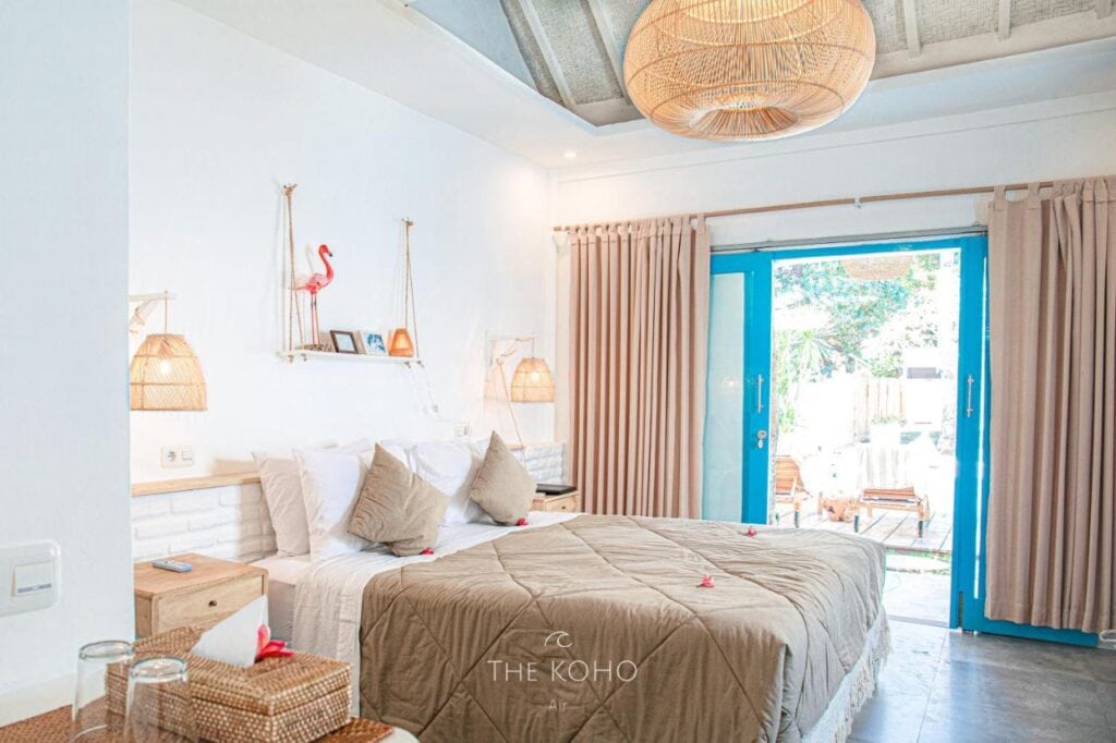 cozy bedroom with boho interiors and white walls