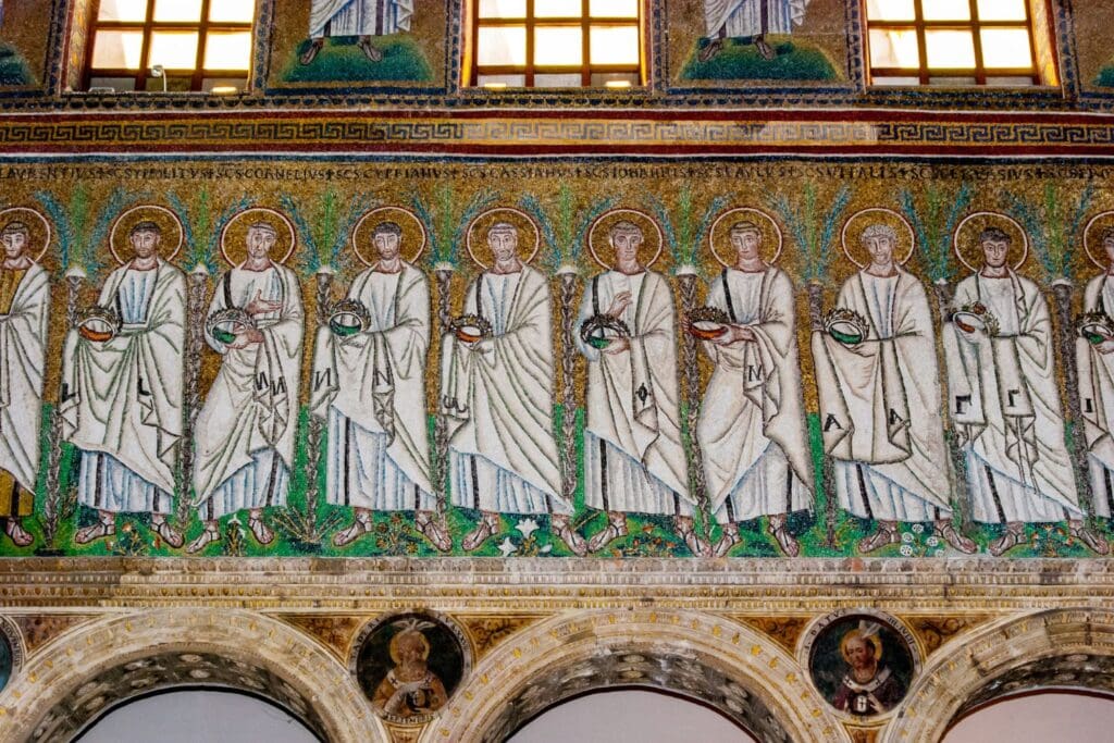 Green and gold tile work in Ravenna featuring saints in white robes