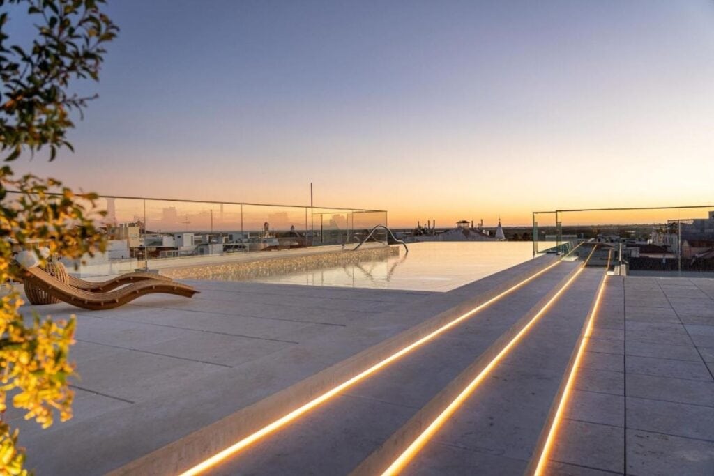3HB Faro Outdoor Swimming Pool at sunset