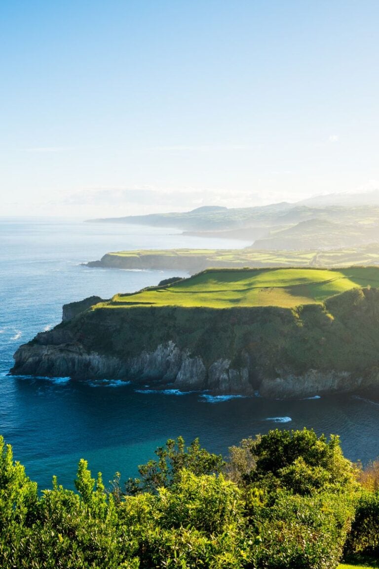 Scenic coastline with lush green cliffs and ocean views for relaxing travel experiences.
