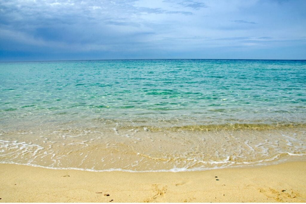 blue green waters and pristine beach sands at Solanas Beach
