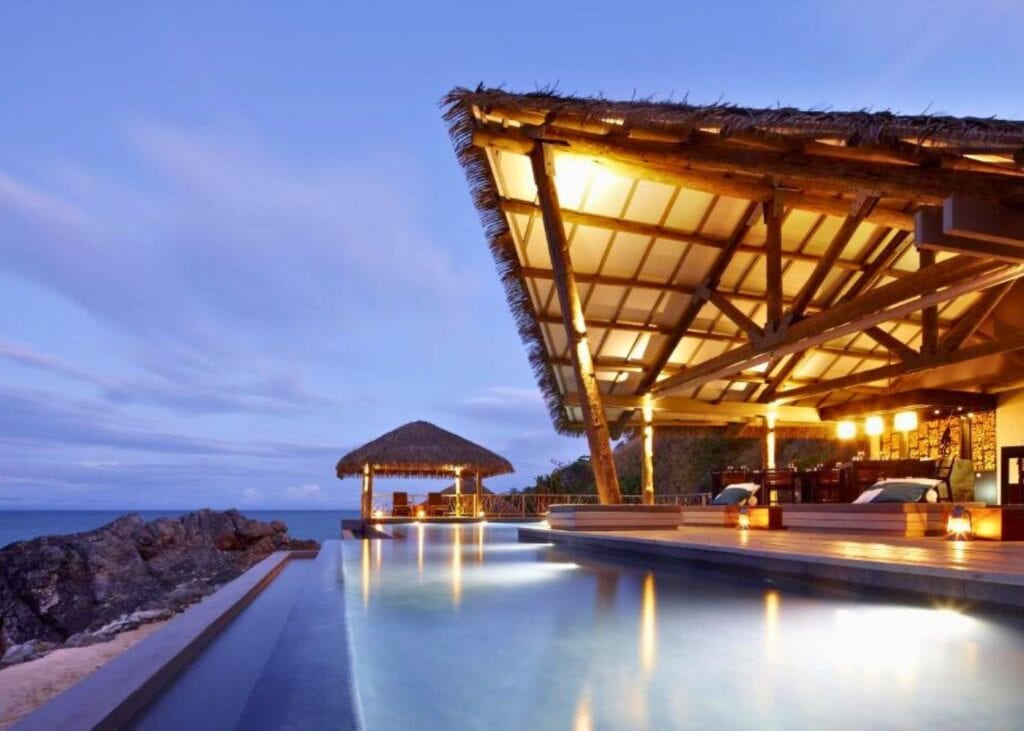 Swimming pool and sun terrace at Tadrai Island Resort