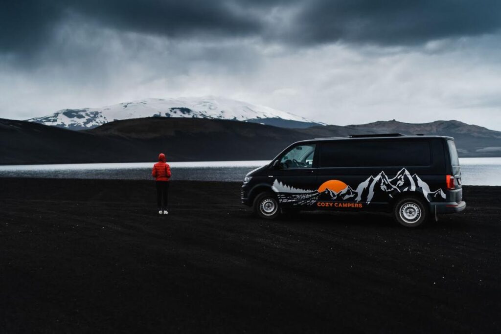 Moody views of the glacier with a campervan